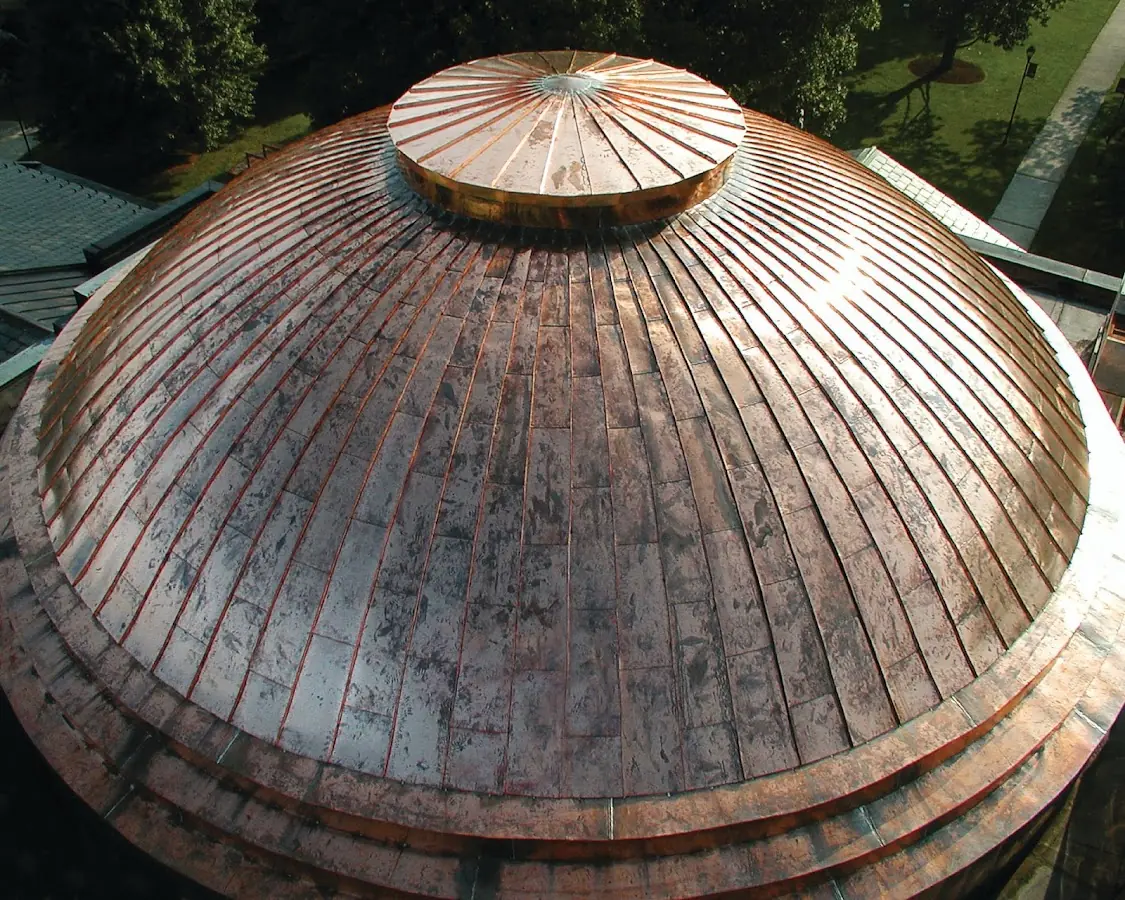 Craftsman Roofing crew installing a new roof in East Windsor